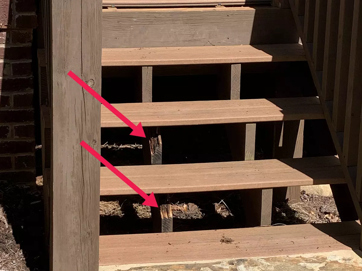 Rotten stair strings on home entrance