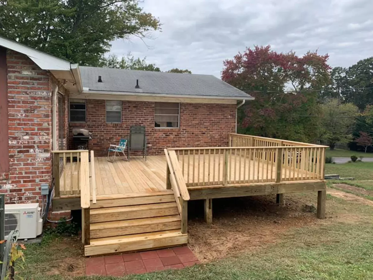 Brick house after deck building project