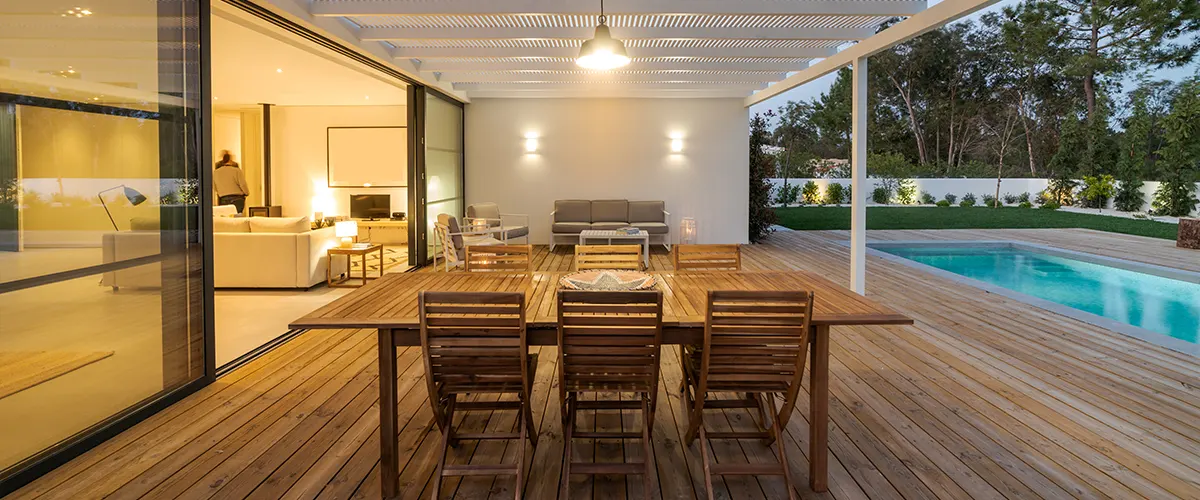 A large deck pool made of wood