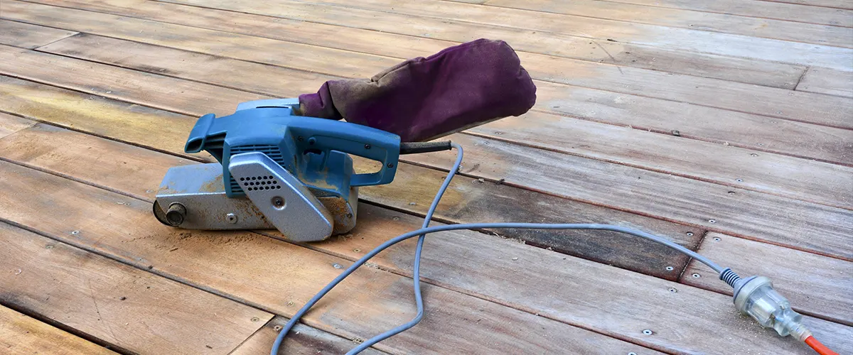 A power sander on a deck