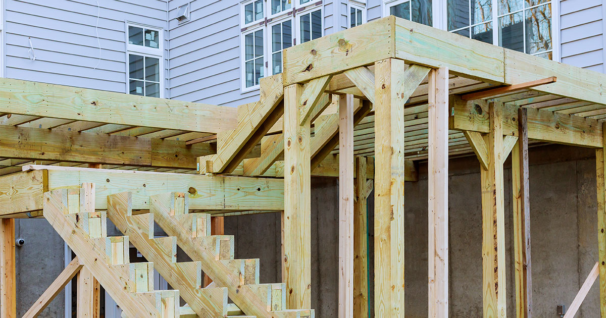 A pressure treated frame for composite decking