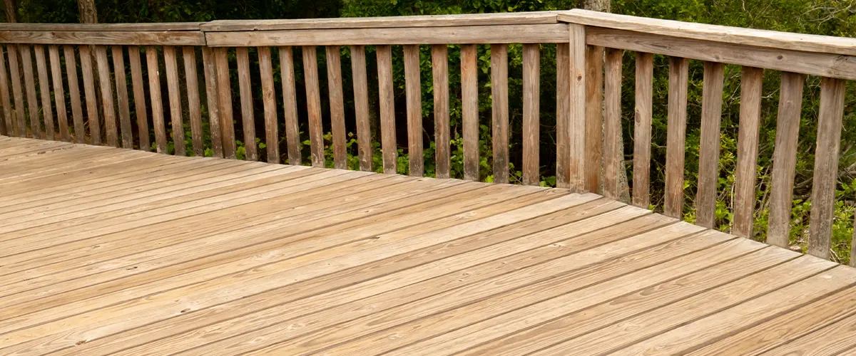 A pressure treated deck and railing