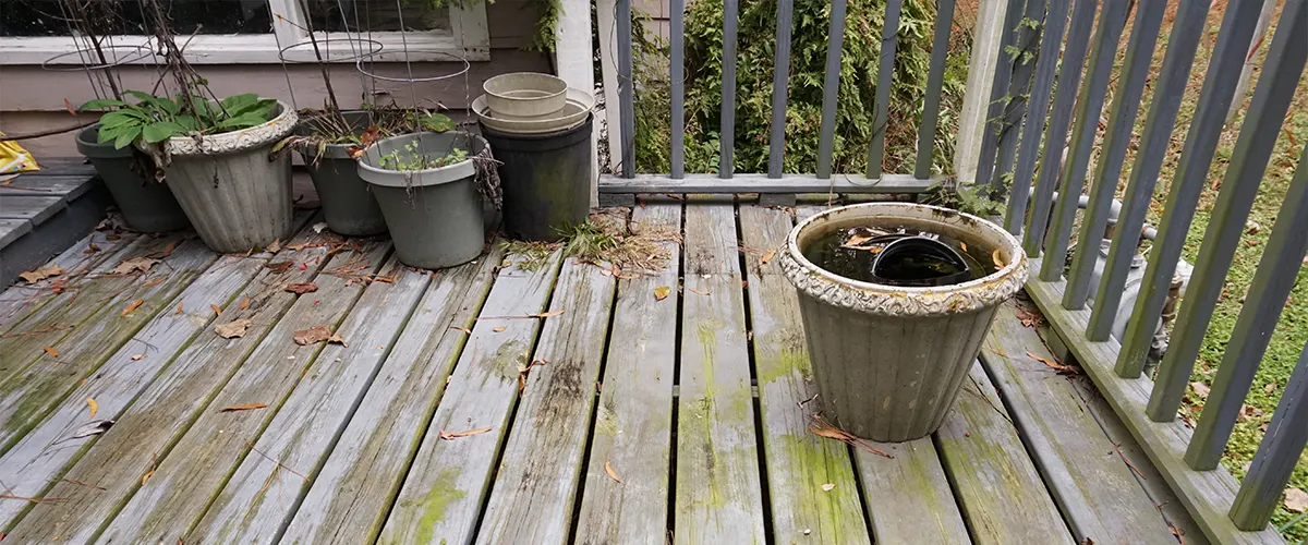 A rotten and worn out deck that needs replaced