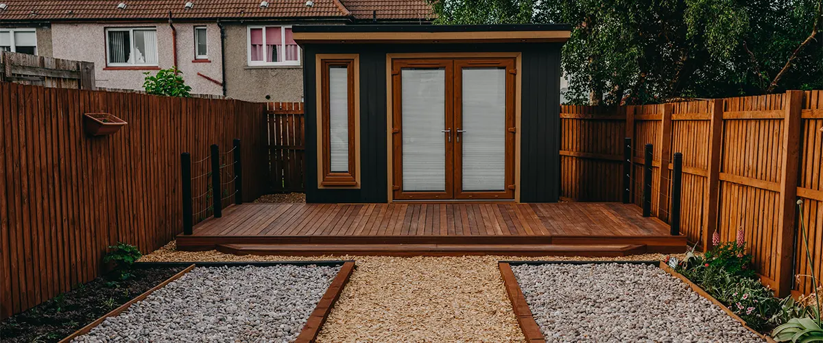 A deck with a shed for extra storage