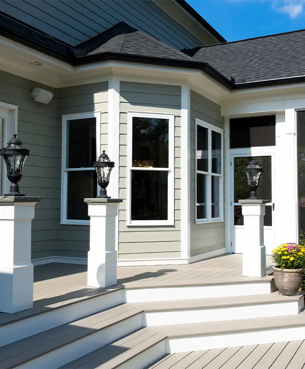 Light beige porch with stairs and composite material, deck stairwell