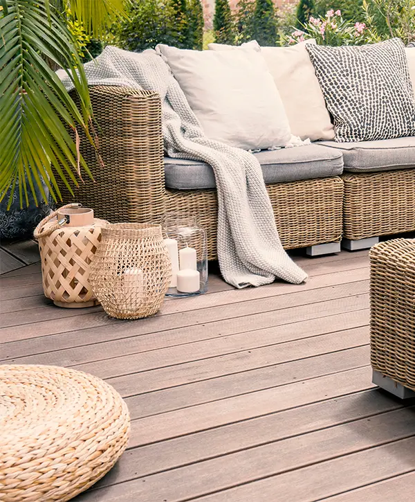 Composite decking with outdoor furniture and plants