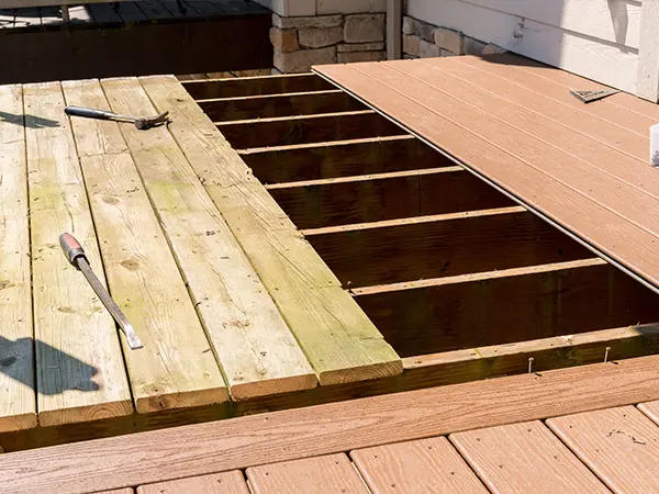 A wood deck being replaced with composite
