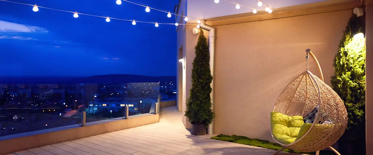 A rooftop deck with deck lighting