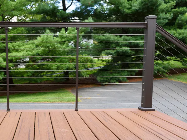 A metal railing for a composite deck