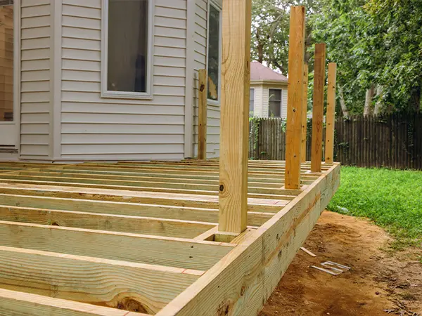 A ground-level deck frame made of wood