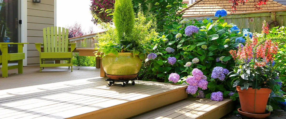 deck with flowers on stairs