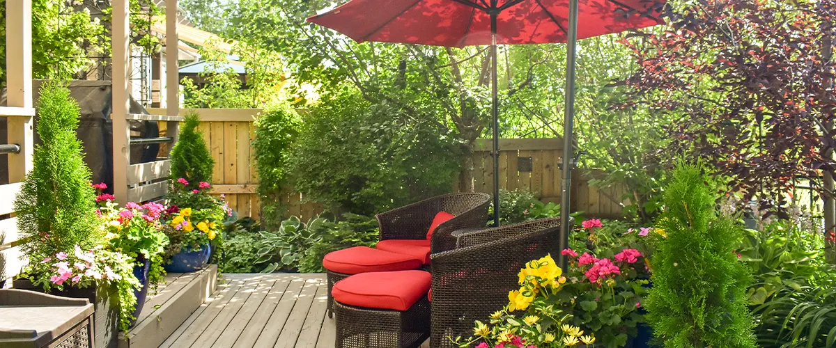 wood deck in backyard with furniture