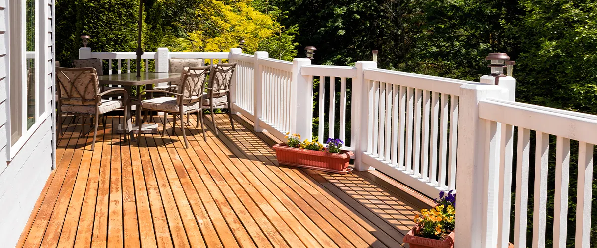 wood deck with white railings