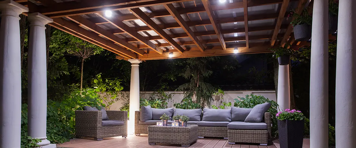 Space underneath deck with chairs and lighting