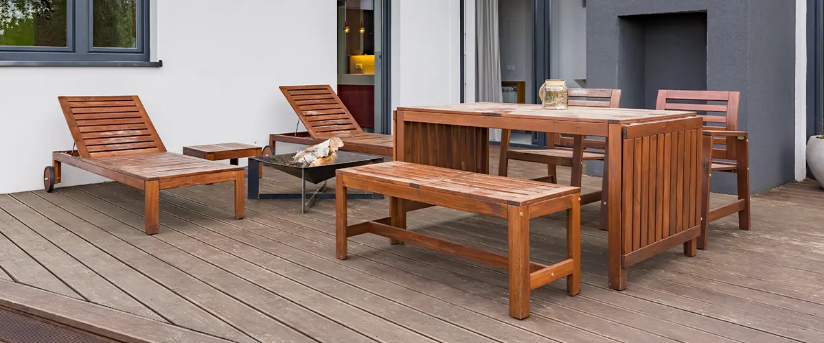 Composite deck with wood furniture