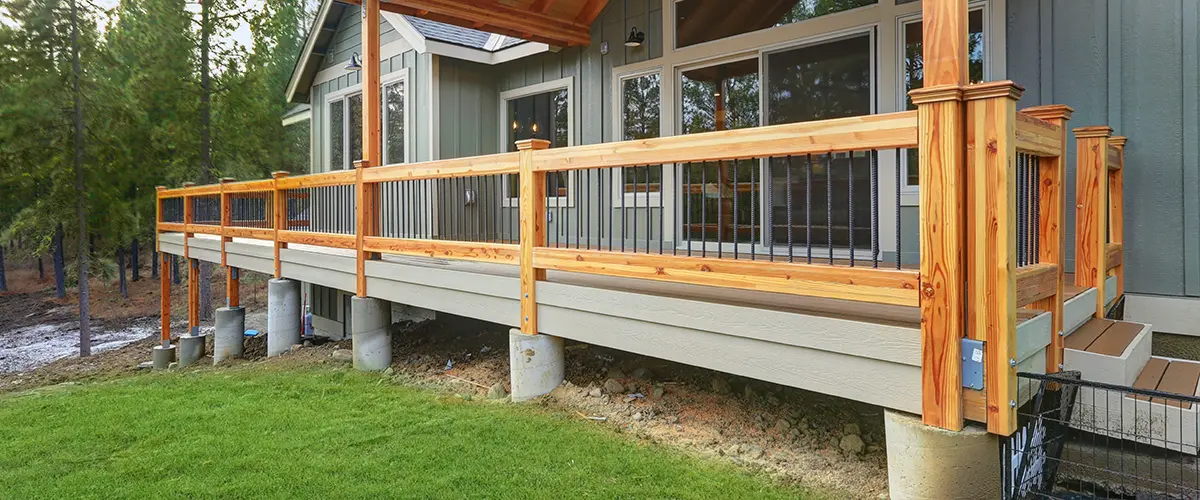 Railing with wood balustrade and metal rails
