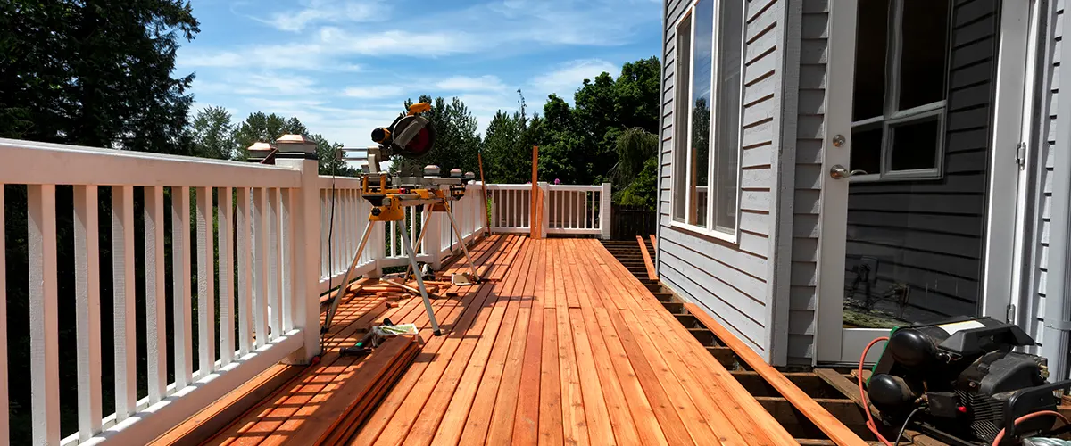 wooden deck in summer from the best deck building companies