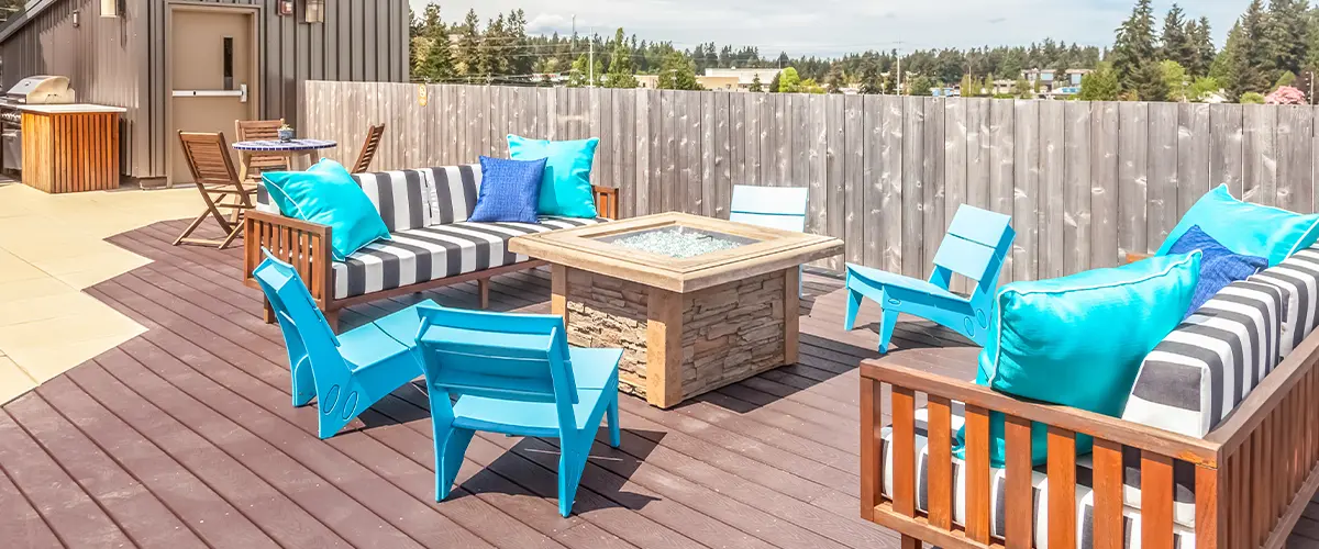rooftop deck with modern blue patio furniture