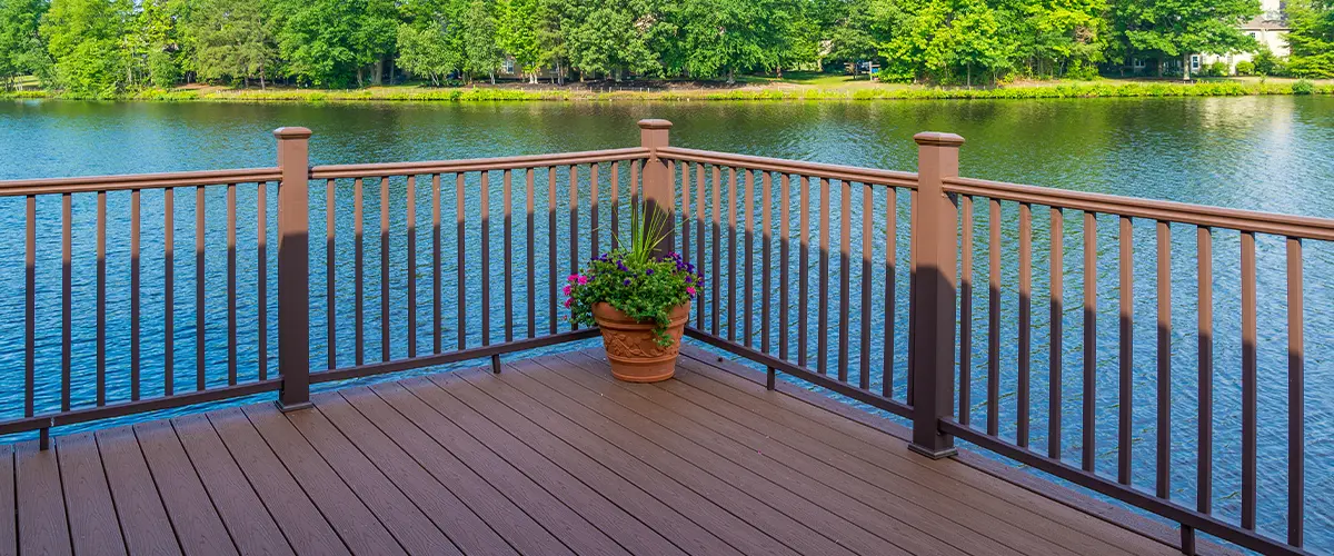 Serene view from a repaired deck with sturdy railings overlooking a beautiful lake in Knoxville, TN