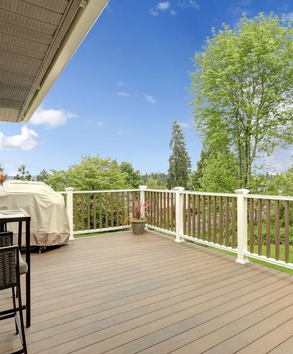 Professional wood deck installation in a residential backyard in Chattanooga, TN.
