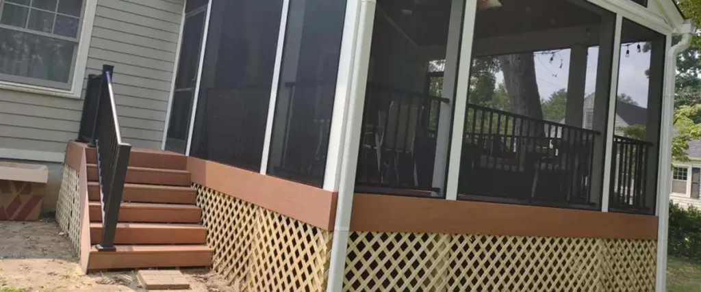 Custom screened deck addition with gable roof, composite stairs and aluminum railing system